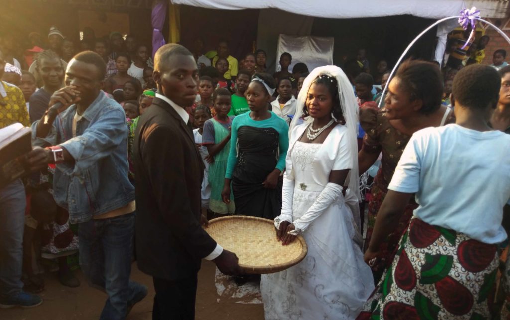 This is how a wedding in Malawi looks like. On the picture you can see the groom and the bride.