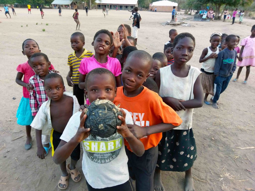 These are kids from Malawi with a soccer made of paper and tape. 