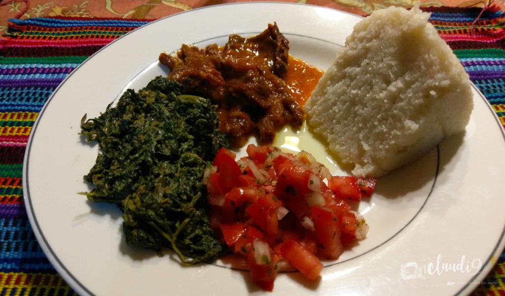 This is Aliya, Osuga, Kachumbari and Ugali, a traditional Kenyan dish.